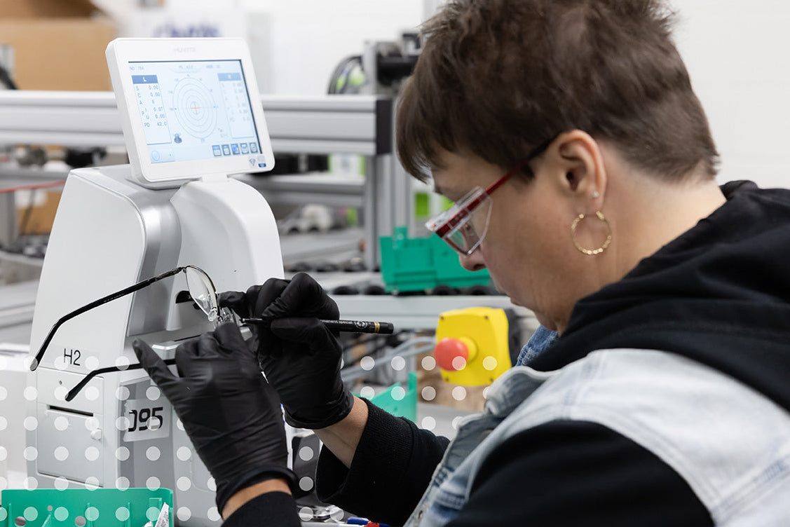 Person working with a machine in a laboratory setting
