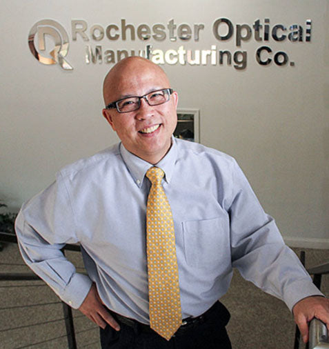 <h2>His Vision, Inc Created</h2><p>Patrick Ho formed <strong>His Vision, Inc.</strong> to acquire the assets of Rochester Optical Manufacturing Company, <strong>reviving the brand and its military contracts</strong>.<br/><br/>🔹 Relocated to <strong>38 Scio Street</strong> in downtown Rochester.</p>