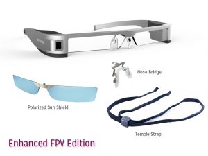 A pair of stainless steel smart glasses, a wire nose bridge, a blue and rectangular polarized sunshield, and a black temple strap.
